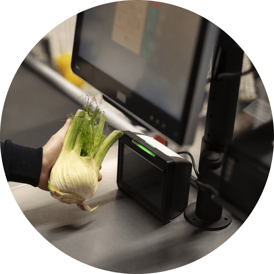 worker scanning vegetable